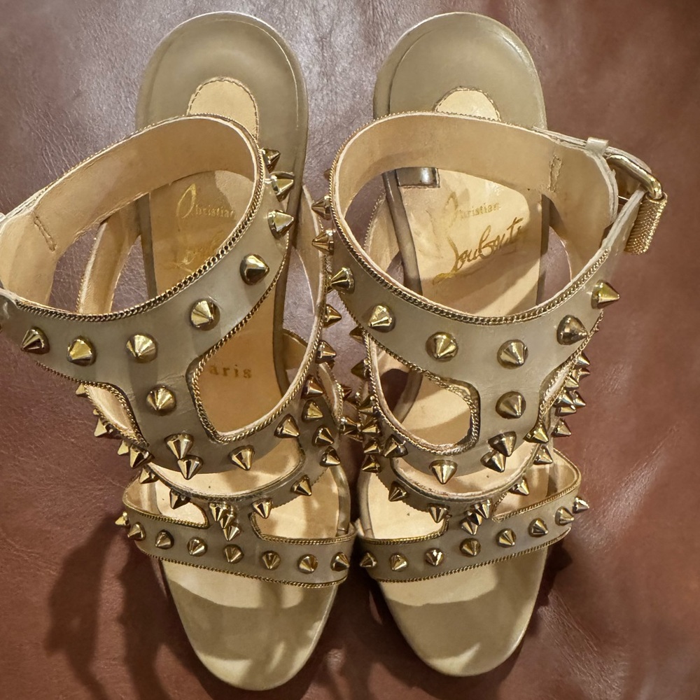 CHRISTIAN LOUBOUTIN 
Jazz Calfskin Sexystrapi 120 Spiked Sandals 35.5 Beige Gold